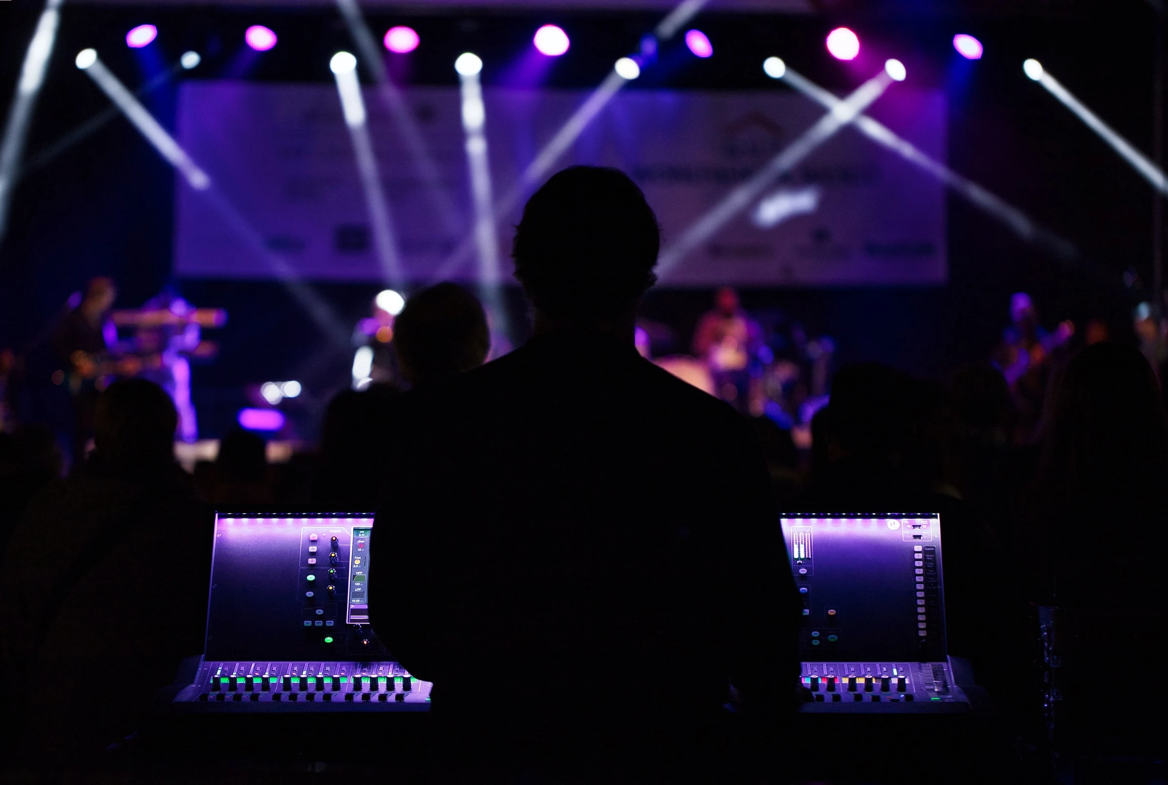 VJ in front of concert stage